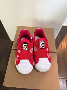 adidas Kids Red and White Slip-On Sneakers with Embroidered Accents